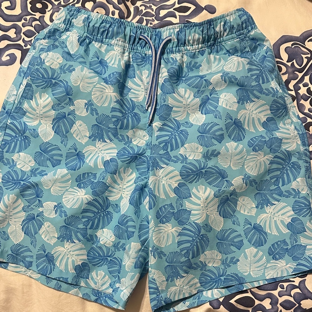 Peter Millar Blue and White Swim Trunks with Tropical Print